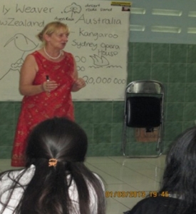 A volunteer, Mrs.Gilly Weaver is teaching English